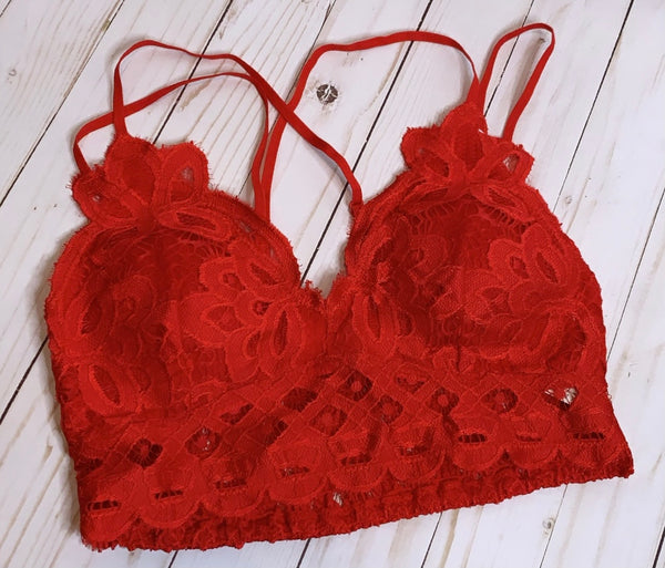 Red Crochet Lace Bralette   Pull over style, long line, all day comfort V neckline  Removal bra pads  Criss-cross straps at back  Adjustable straps with perfect amount of stretch  Fabric: 90% nylon, 10% spandex  