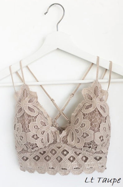 Light Taupe Crochet Lace Bralette   Pull over style, long line, all day comfort V neckline  Removal bra pads  Criss-cross straps at back  Adjustable straps with perfect amount of stretch  Fabric: 90% nylon, 10% spandex  