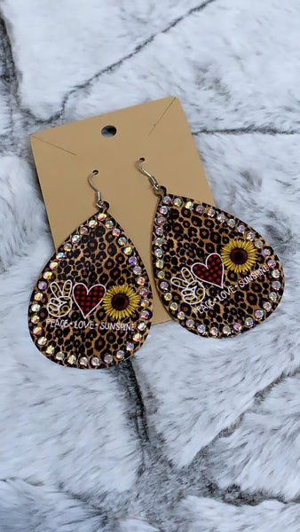 Leopard Peace*Love*Sunshine metal earrings *Medium weight *Detailed with iridescent stones *Weight 0.6oz *Lead Compliant