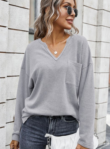 Soft breathable knitted fabric shapes this comfy blouse with special notched neckline, long sleeves and relaxed fit.   Fabric: 97% POLYESTER 3%SPANDEX