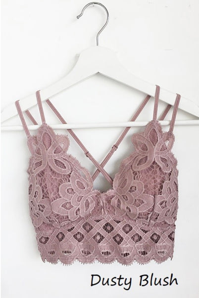 Dusty Blush Crochet Lace Bralette   Pull over style, long line, all day comfort V neckline  Removal bra pads  Criss-cross straps at back  Adjustable straps with perfect amount of stretch  Fabric: 90% nylon, 10% spandex  